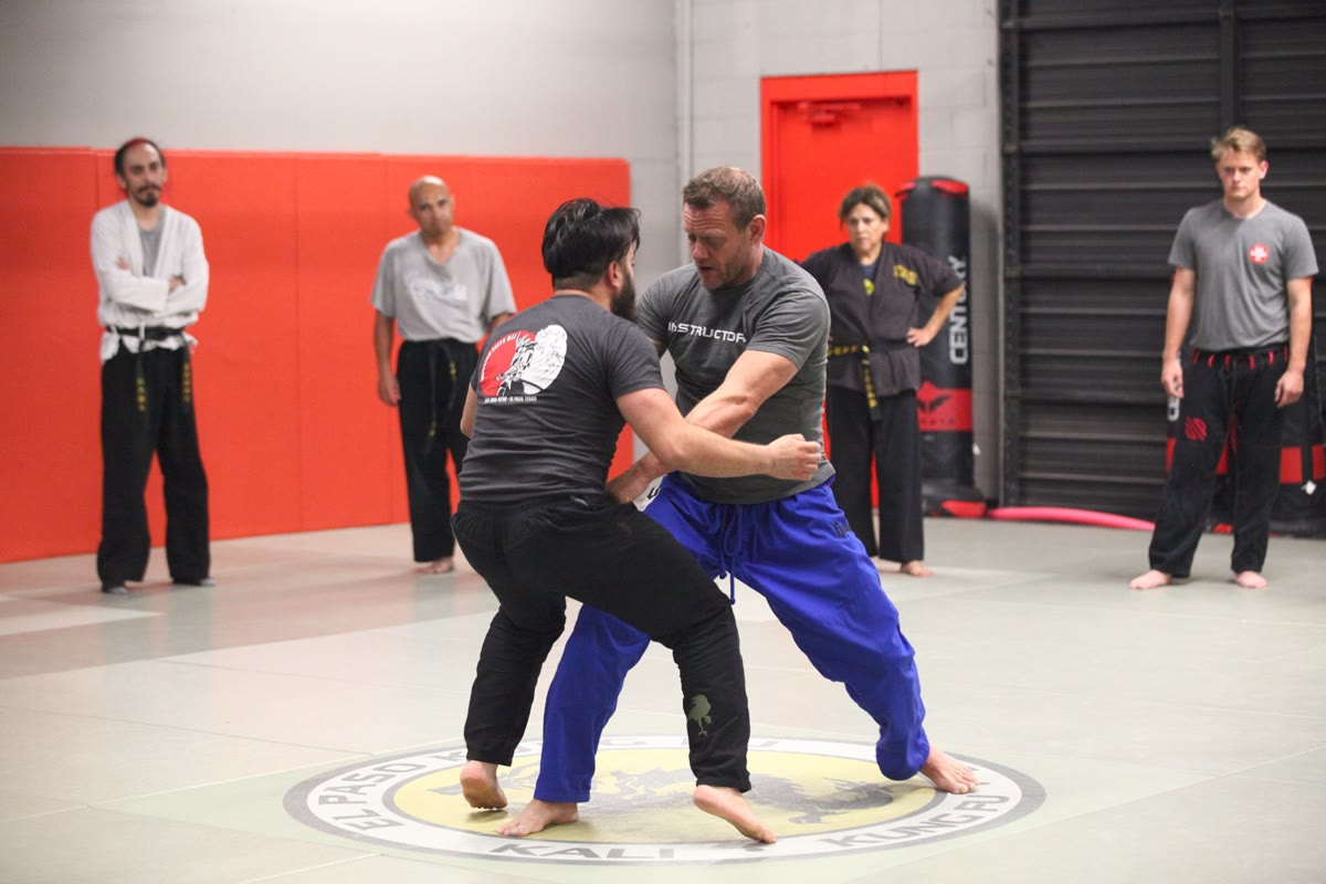 Instructor leading a self-defense seminar at El Paso Kung Fu